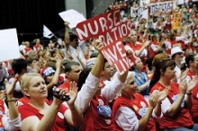 Nurses demonstrating with banner "Nurse ratios save lives"