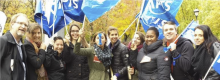 Quebec union members holding flags
