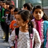 Children queuing up outside a charter school