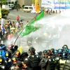Police use water cannon againt protestors in Daegu, Korea