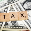 Photo: Tax - Creative Commons - 401Kcalculator.org