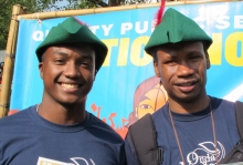 Two young men wearing Robin Hood caps