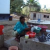Picture of african woman washing dishes